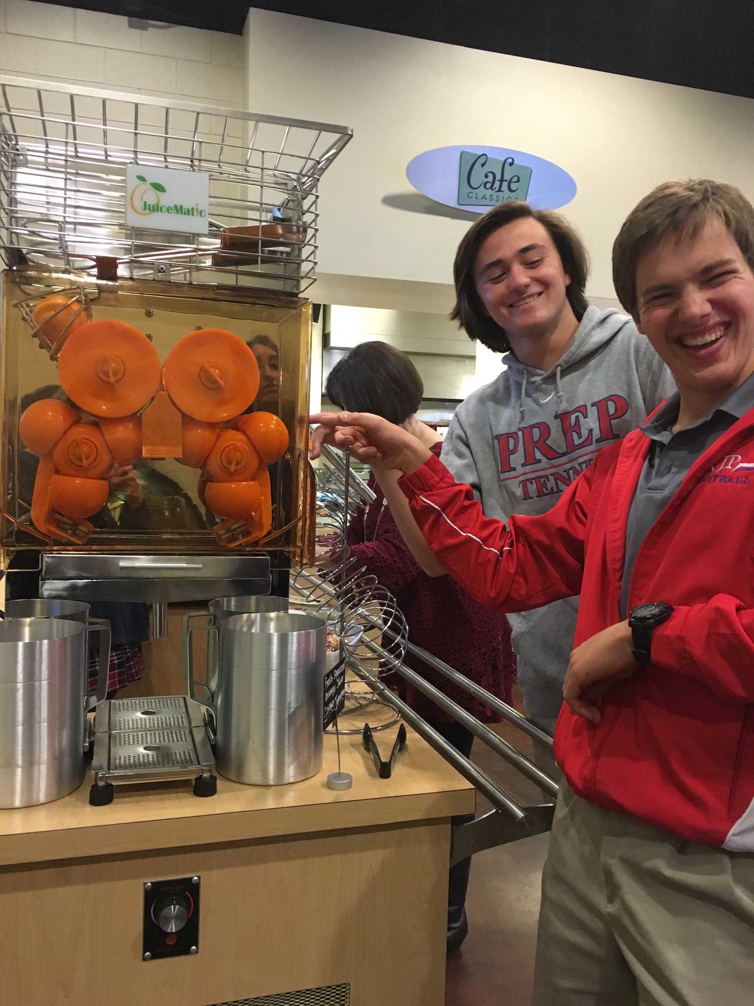 Prep students, Hayes Newcomb and Tate Fowler, test out the new Juicer. Photo by Ann Clardy Byrd.