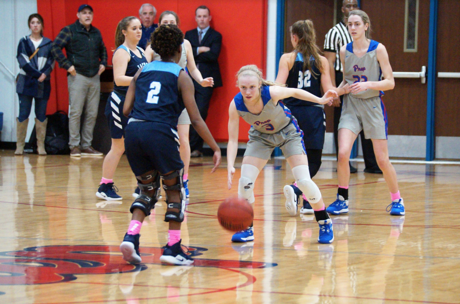 Sophomore guard Andie Flatgard stops her opponent near the half-court line during the regular season.